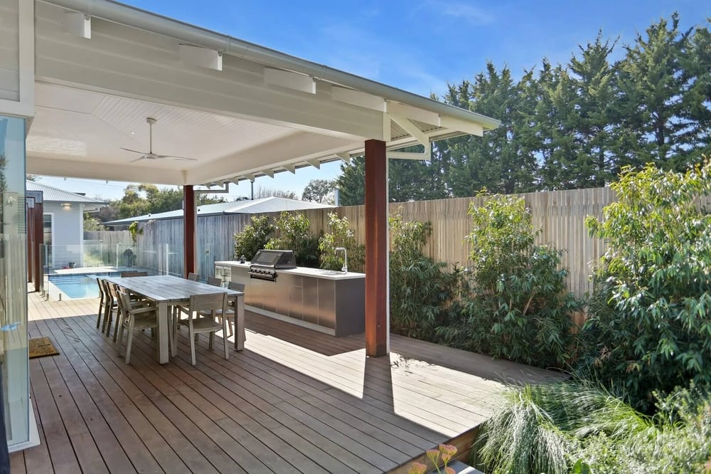 Outdoor barbecue surrounded by greenery